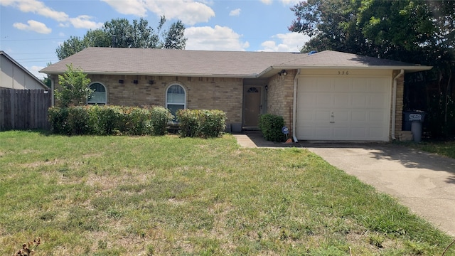 single story home with a garage and a front yard