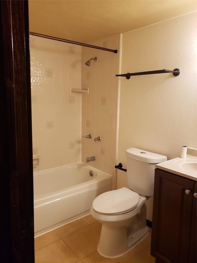 full bathroom with shower / bathtub combination, tile patterned floors, vanity, and toilet