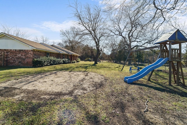 view of yard with a playground