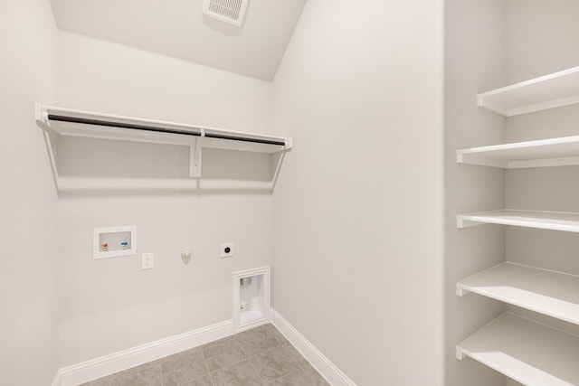 laundry room featuring gas dryer hookup, washer hookup, and hookup for an electric dryer