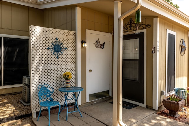 property entrance with central AC unit