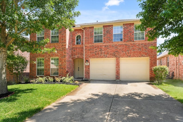 view of front facade featuring a garage and a front yard