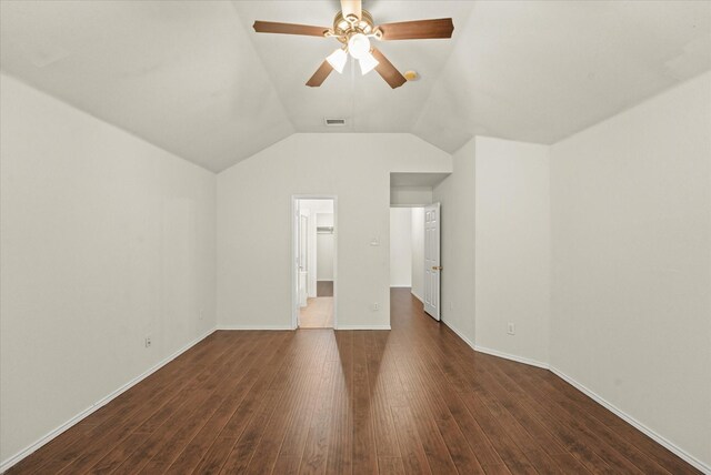 interior space with lofted ceiling, wood-type flooring, and ceiling fan