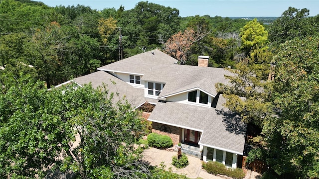 aerial view with a wooded view