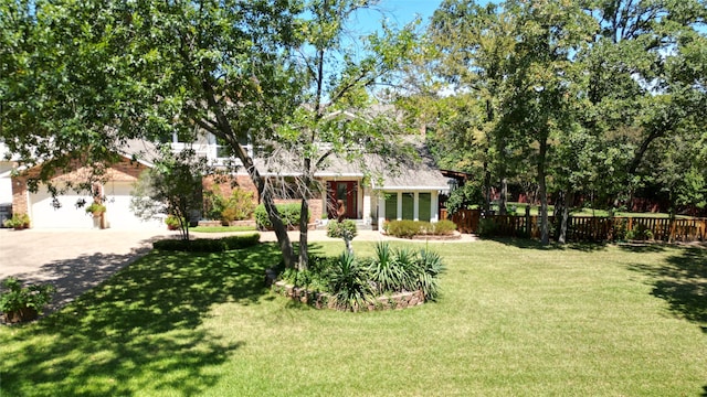 view of yard with a garage