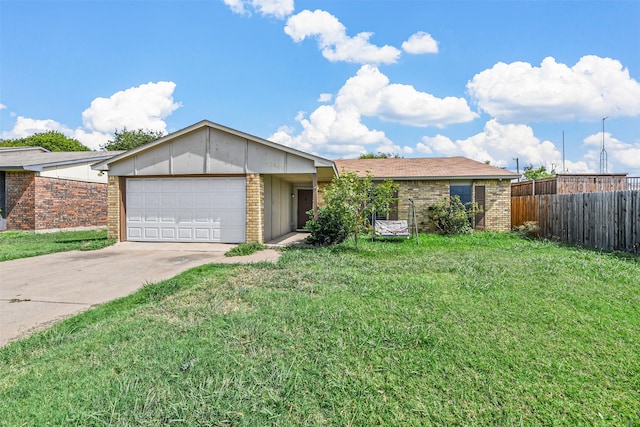 single story home featuring a garage and a front yard