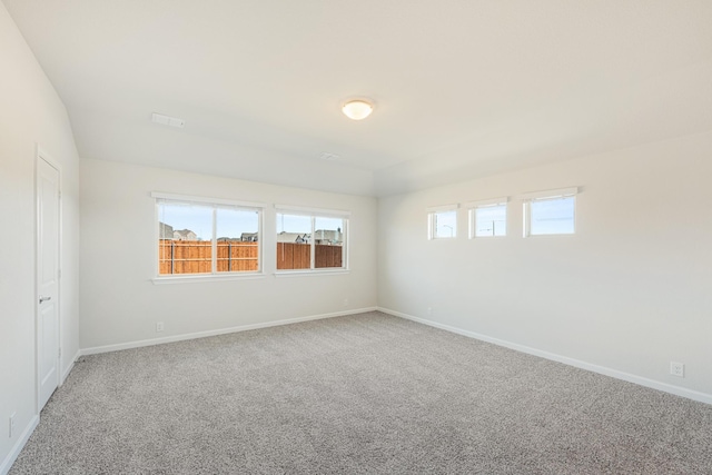 unfurnished room featuring carpet floors