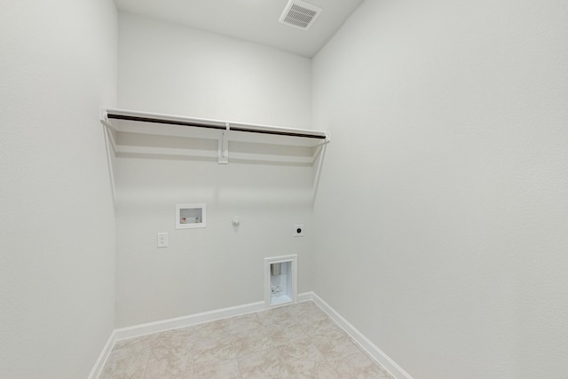 washroom featuring gas dryer hookup, hookup for a washing machine, and hookup for an electric dryer