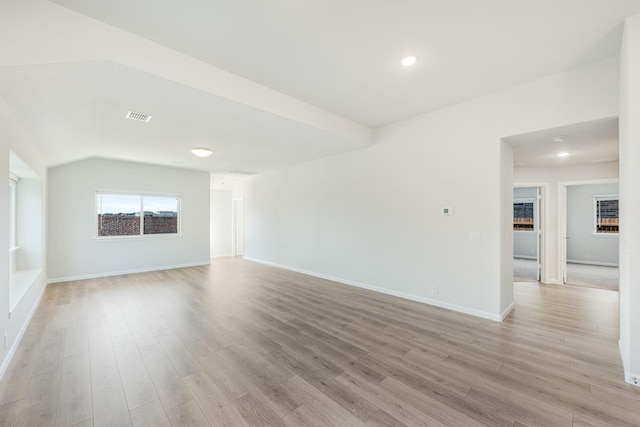 spare room featuring light hardwood / wood-style floors