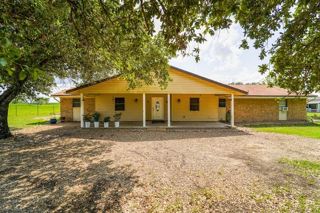 view of front of house with a carport