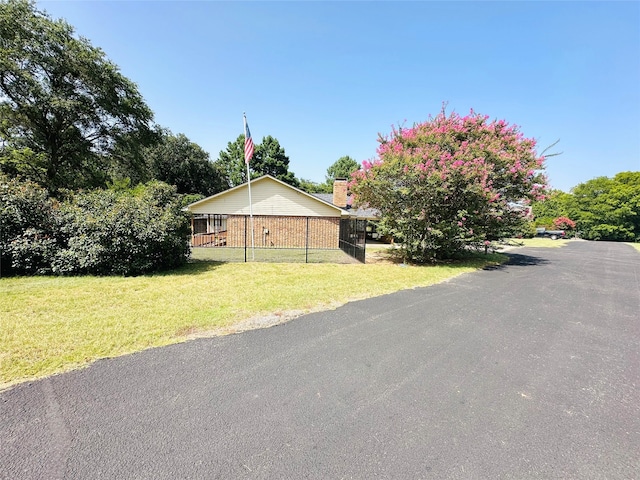 exterior space featuring a front yard