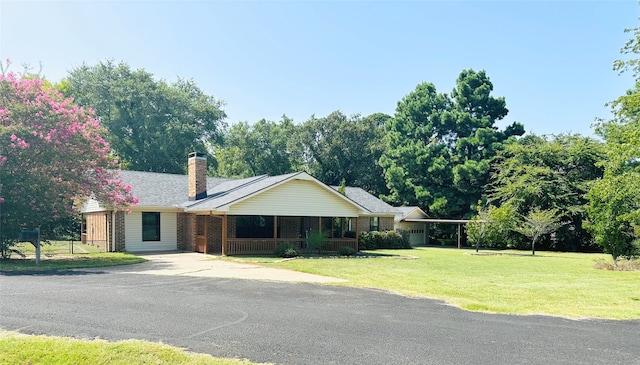 ranch-style house with a front lawn