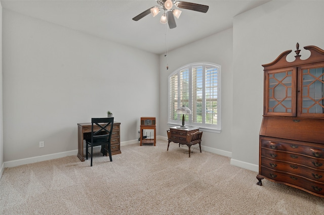 interior space with light colored carpet and ceiling fan