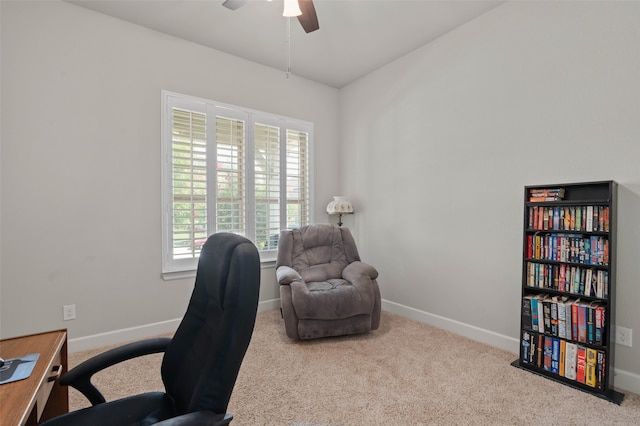 carpeted home office featuring ceiling fan and plenty of natural light