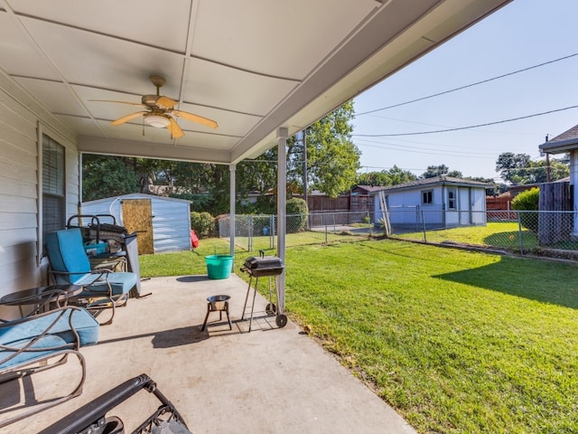 exterior space featuring a storage shed and ceiling fan