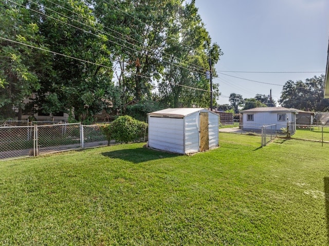 view of yard with a storage unit