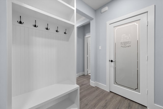 mudroom with light hardwood / wood-style flooring