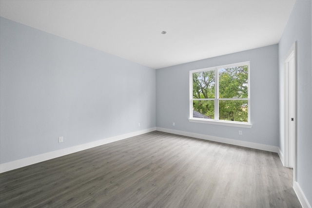 unfurnished room featuring hardwood / wood-style floors