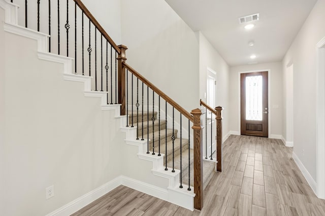 entrance foyer with light wood-type flooring