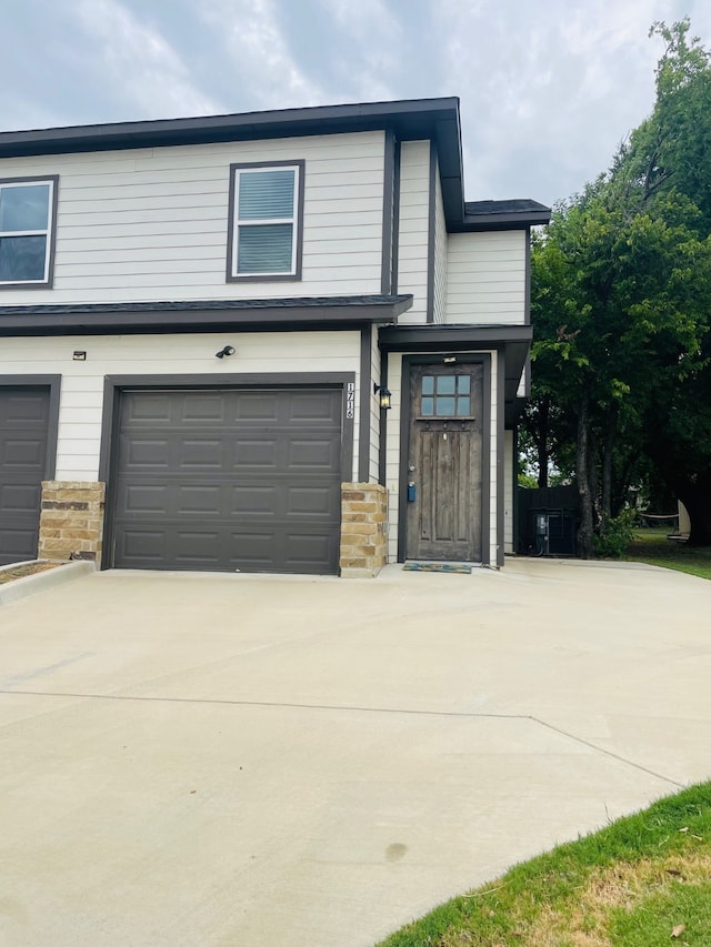 view of front of house with a garage