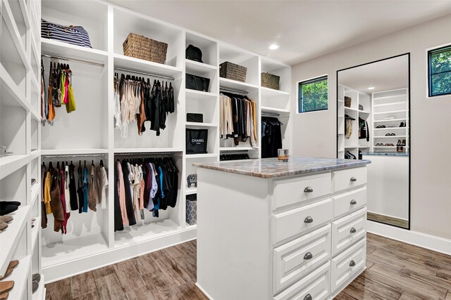 spacious closet with wood finished floors