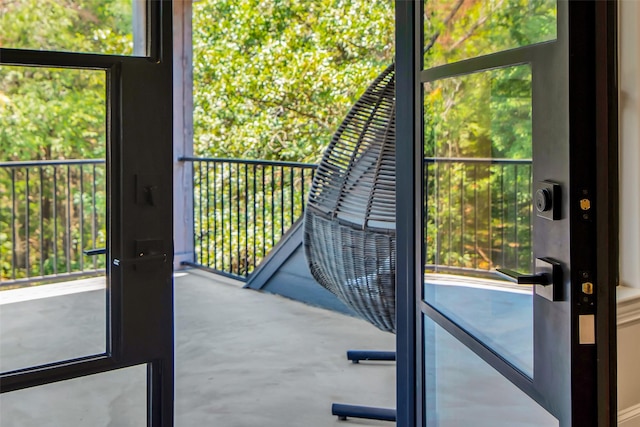 doorway with concrete floors