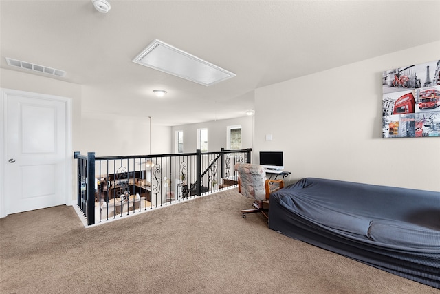 sitting room with carpet floors