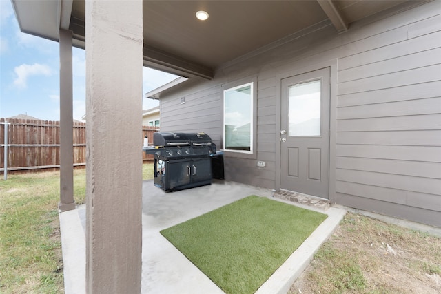 exterior space with a patio area and a yard