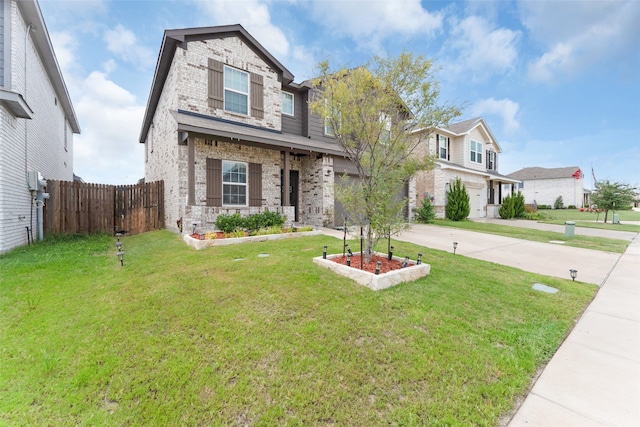 craftsman-style house with a garage and a front lawn