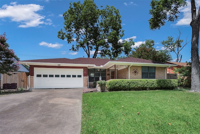 ranch-style house with a garage and a front yard