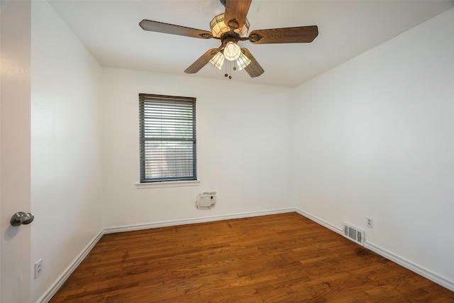 empty room with hardwood / wood-style flooring and ceiling fan