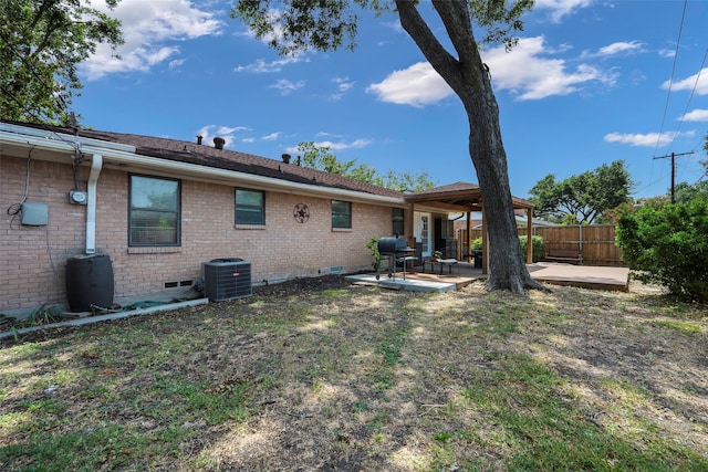 back of house featuring a patio and cooling unit