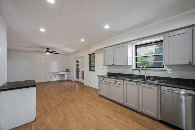 kitchen featuring ceiling fan, light wood-type flooring, ornamental molding, sink, and dishwasher