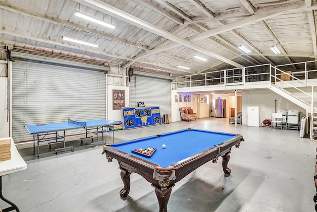 rec room featuring concrete floors and billiards