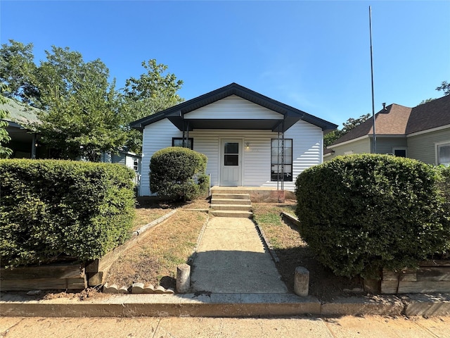 bungalow-style home with covered porch