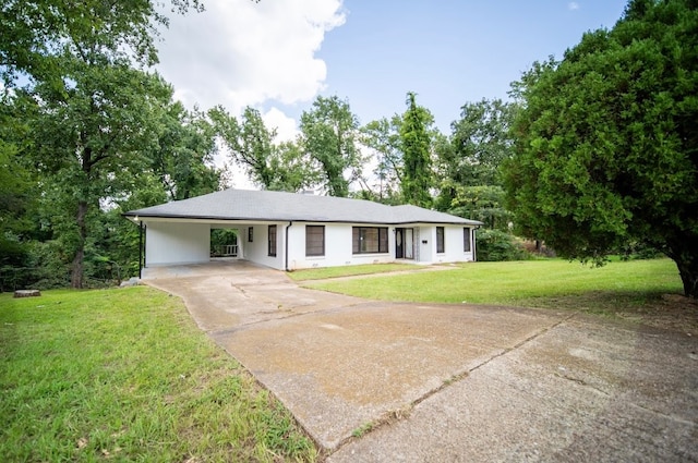 ranch-style house featuring a carport and a front yard