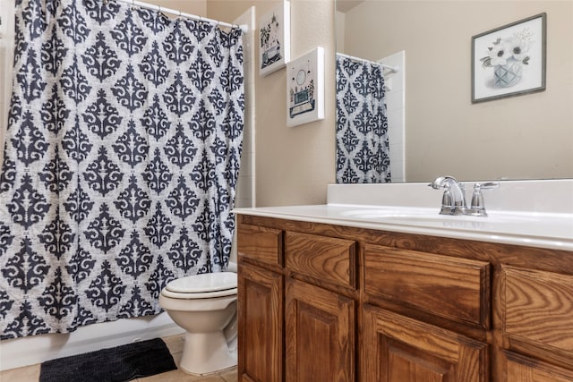 bathroom with tile patterned floors, vanity, toilet, and a shower with shower curtain