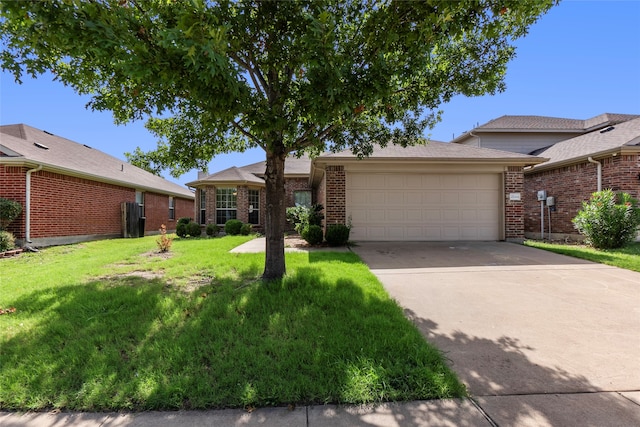 ranch-style home featuring a garage and a front yard