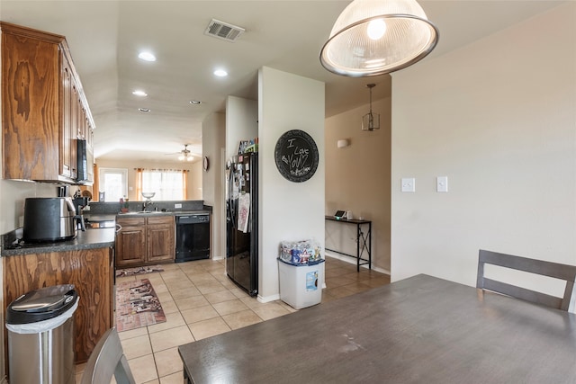 kitchen with black appliances, ceiling fan, sink, and light tile patterned flooring