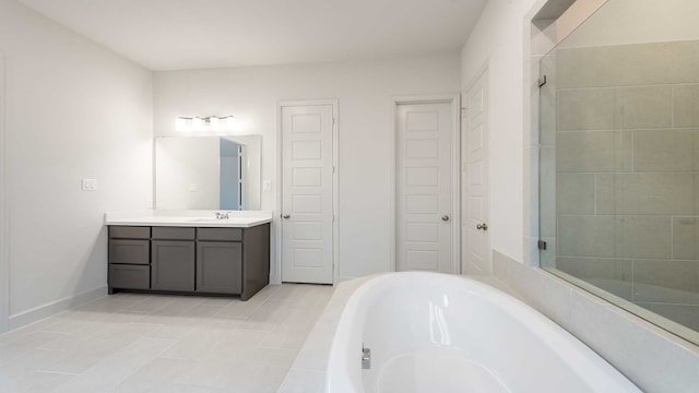 bathroom featuring vanity, plus walk in shower, and tile patterned floors