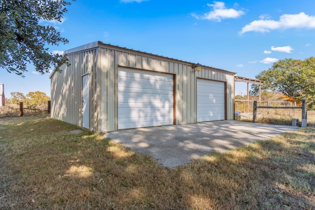 garage with a yard