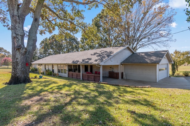 ranch-style house with a garage and a front yard