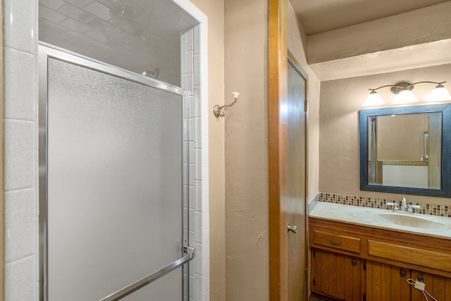 bathroom featuring vanity and walk in shower