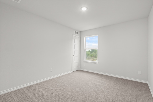 empty room featuring carpet flooring