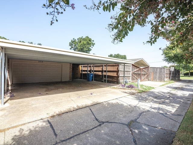 exterior space featuring a carport