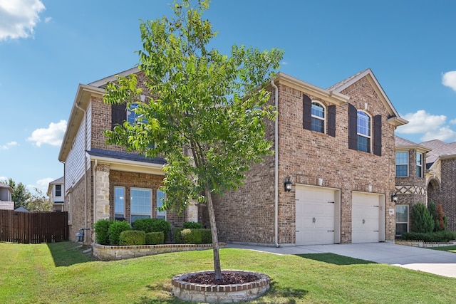 view of front of home with a front yard and a garage