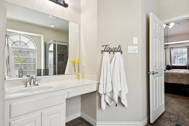 bathroom with tile patterned floors and vanity