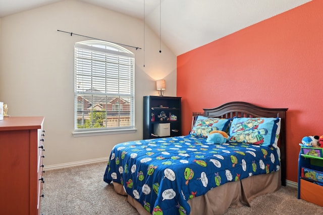 bedroom with light carpet and lofted ceiling