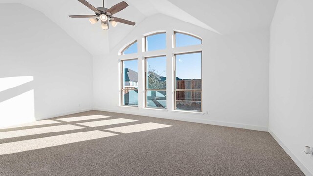 interior space with carpet, high vaulted ceiling, and ceiling fan