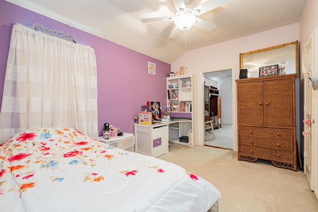 bedroom featuring light colored carpet, ceiling fan, and vaulted ceiling